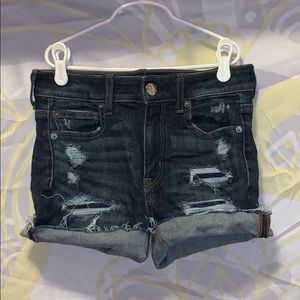 Dark blue denim distressed shorts